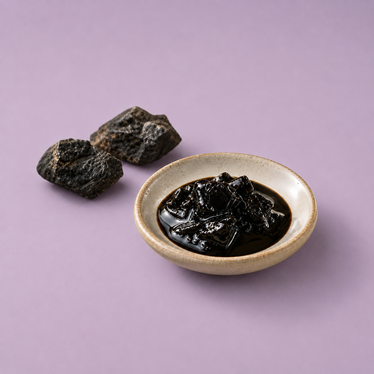Shilajit resin and mineral pieces